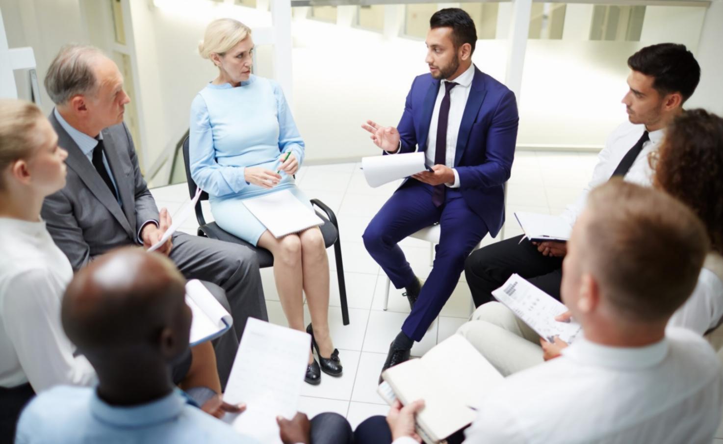 Financial analyst reviewing valuation models and spreadsheets