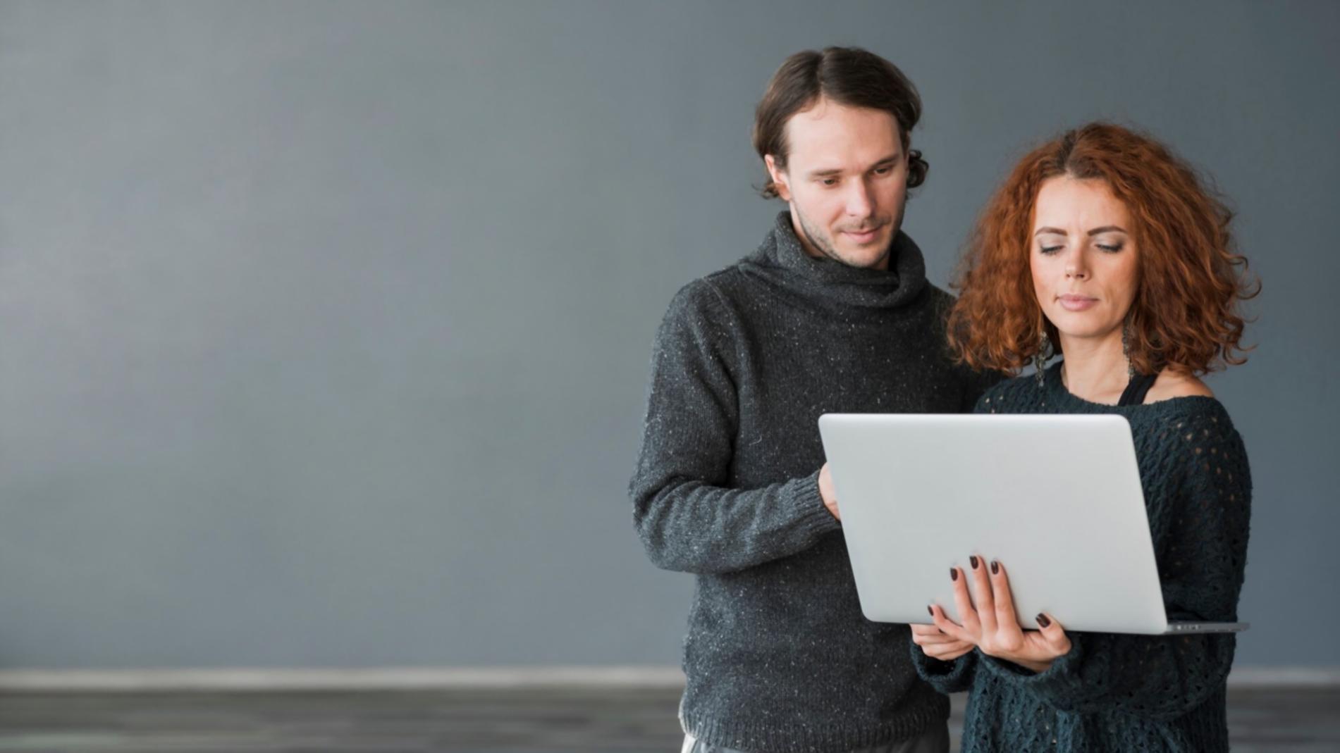 Financial analyst reviewing company valuation reports and market data